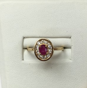 14K Yellow Gold Ruby with Diamond Halo Ring Size 7 .30 ct oval Ruby .50 ct diamonds Original price: $999 Sale price: $499 