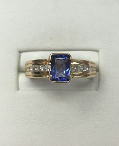 14K Yellow Gold Tanzanite and Diamond Ring Size 6 1 ct tanzanite .40 ct diamonds Original Price: $1799 Sale Price: $999